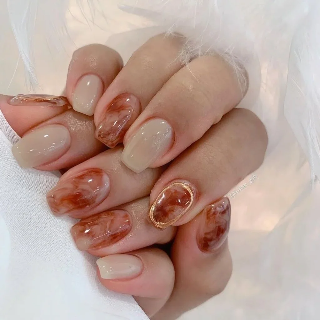 Nude & Caramel Marble Nails with Gold Frame Accent