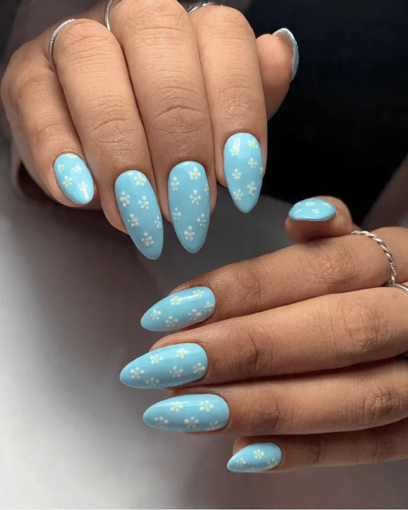 Blue Sky Nails with Flowers Nail Art