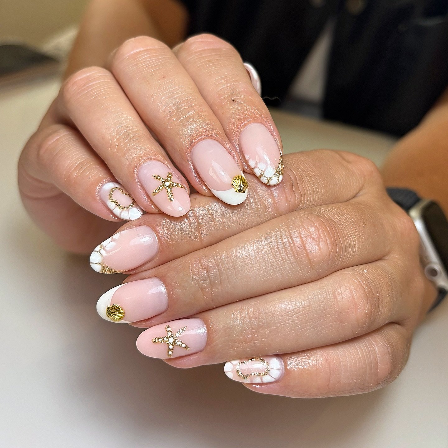 Blush Pink French Tips with Gold Seashell Accents