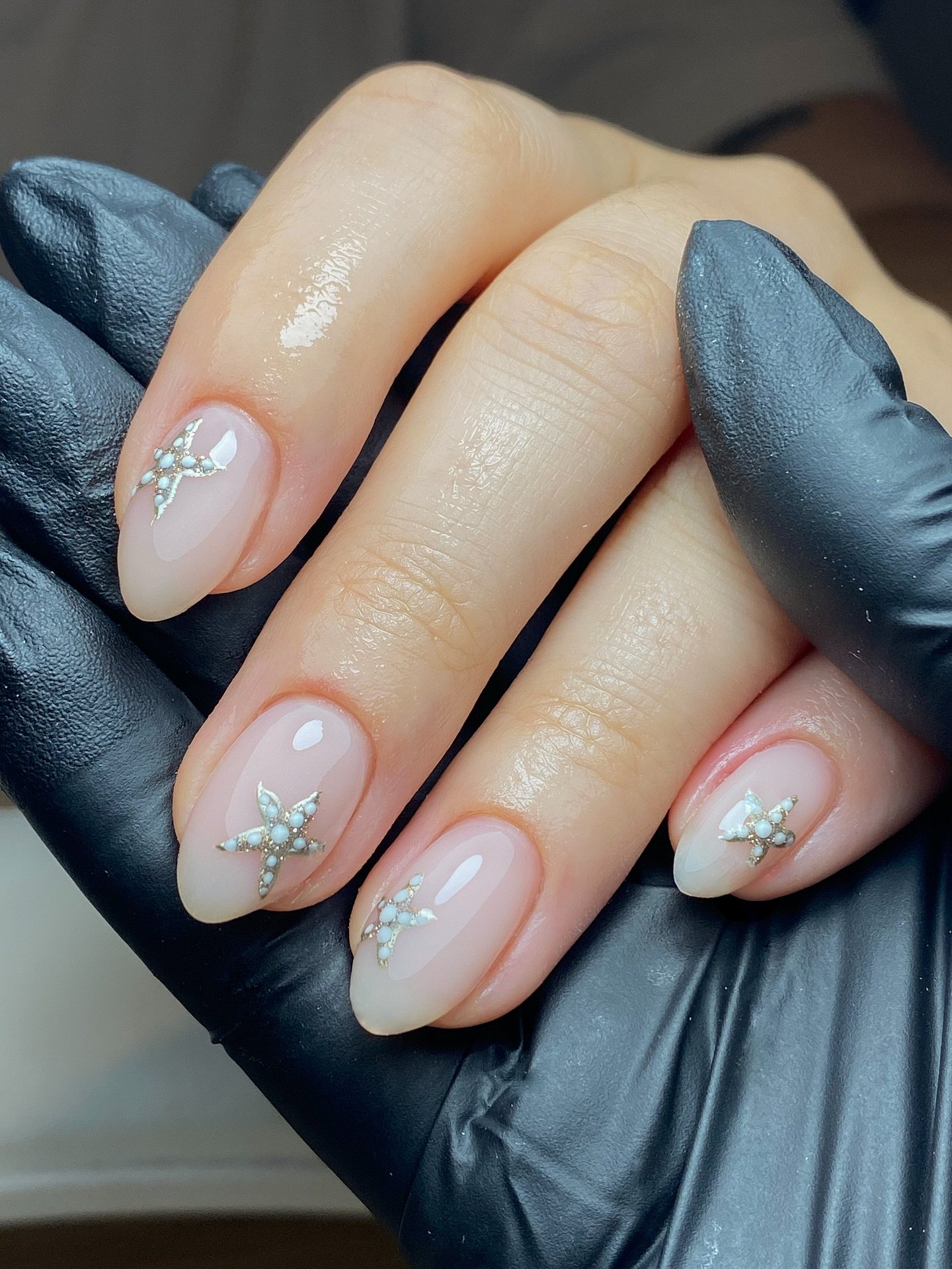 Nude Almond Nails with Pearl Starfish Charms