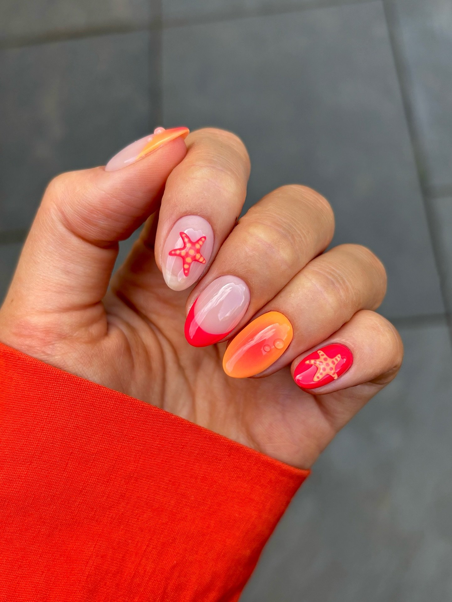 Orange Ombré Nails with Bold Starfish Art