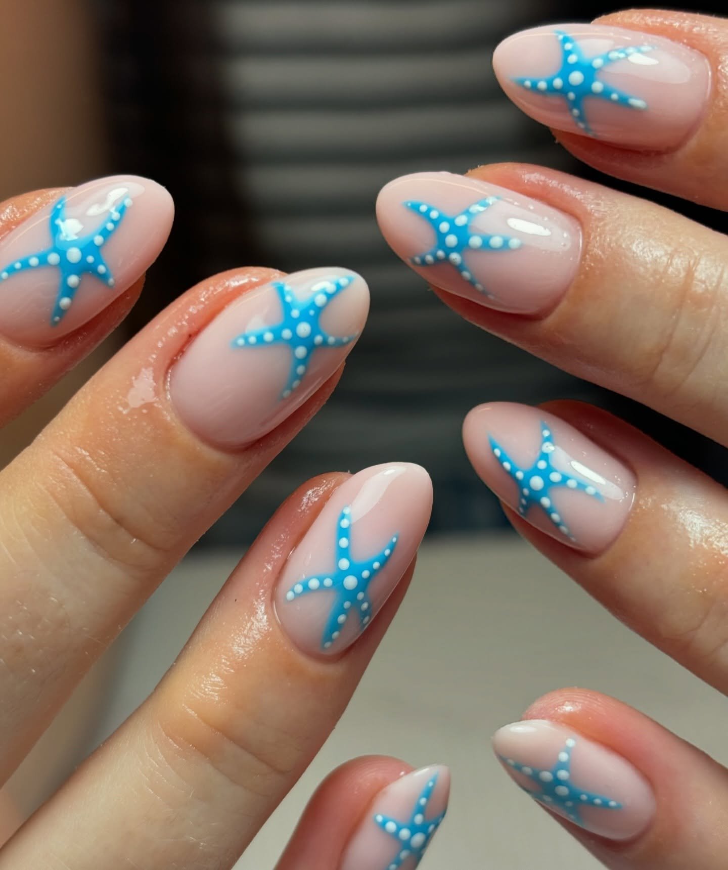 Sheer Almond Nails with Turquoise Starfish Art